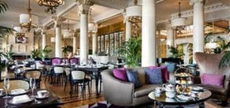 Elegant dining area with plush seating and classic decor.