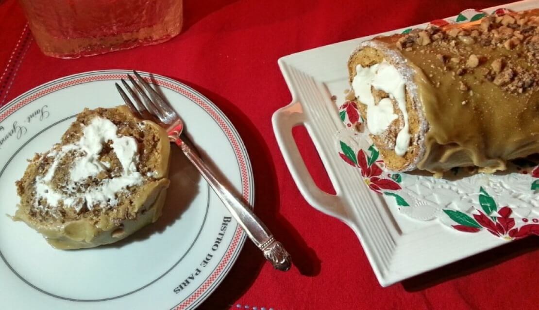 Two slices of cake on festive plates with a fork.