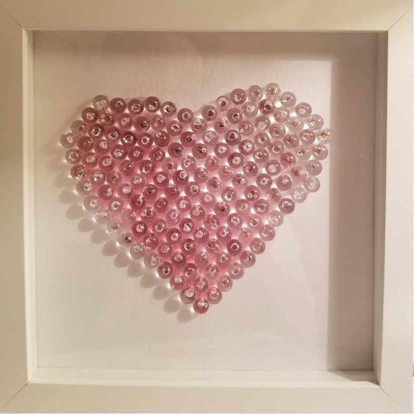 Delicious heart and bird-shaped cookies on elegant plates.
