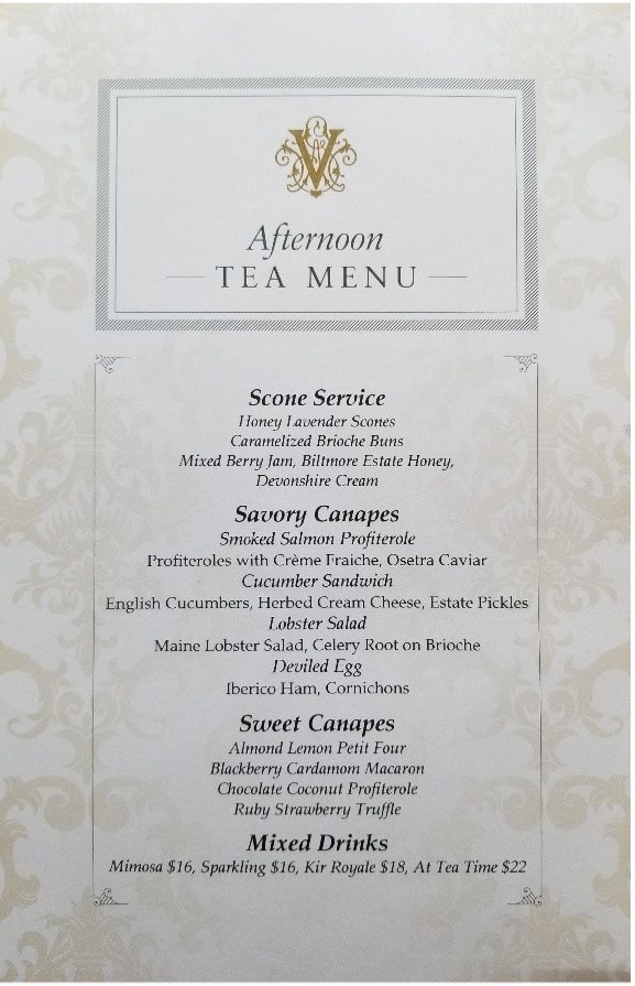 Elegant afternoon tea menu with savory and sweet options.