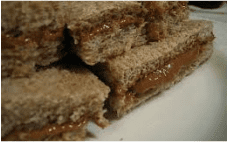 Close-up of caramel-filled graham cracker sandwiches.