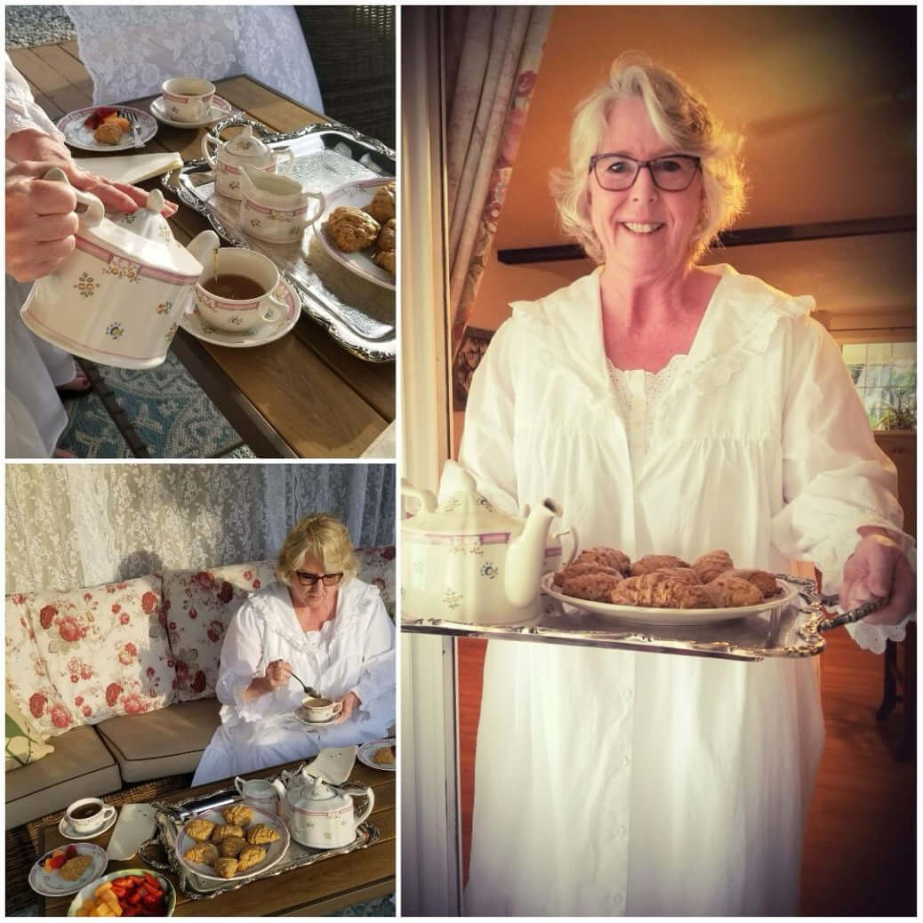 Woman serving homemade treats in a cozy setting.