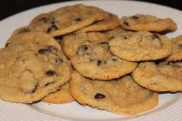 A pile of freshly baked chocolate chip cookies.