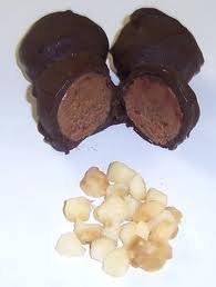 Chocolate-covered hazelnut confection with whole hazelnuts.