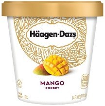 A tub of Häagen-Dazs mango sorbet with a golden lid.
