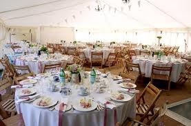 Elegant banquet hall with round tables set for a formal event.