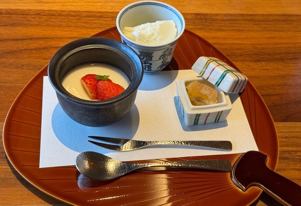 A traditional Japanese meal with rice, soup, and pickles.