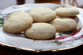 Close-up of round cookies on a floral plate.