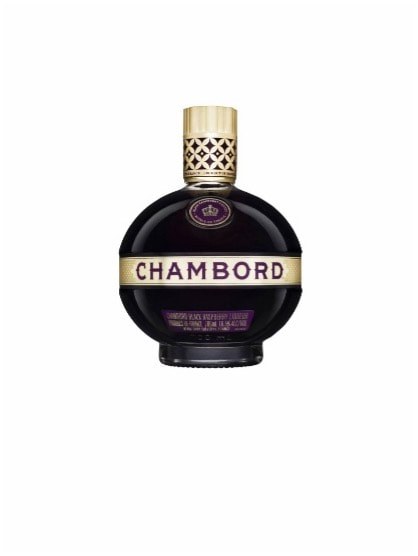 A round bottle of Chambord black raspberry liqueur with a gold cap.