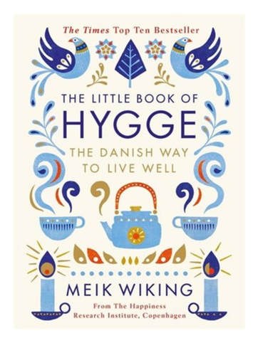 Cover of 'The Little Book of Hygge' by Meik Wiking with cozy Danish-themed illustrations.