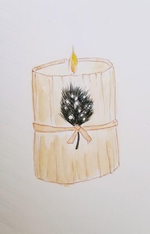 A lit candle decorated with a small pinecone and tied with a string.