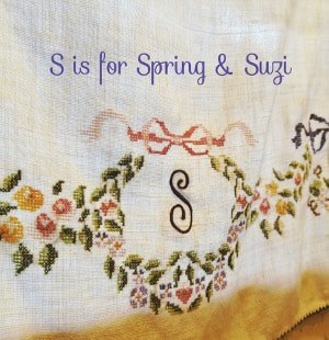Embroidered floral design with letter S and text for Spring & Suzi.