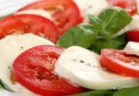 Fresh Caprese salad with tomato, mozzarella, and basil.