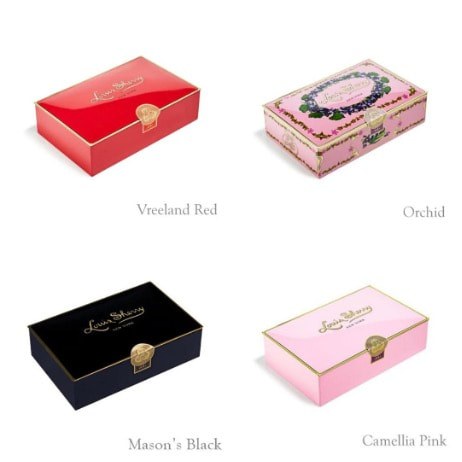 Four elegant boxes in different colors and designs.