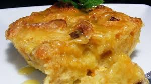 Close-up of a cheesy baked casserole with browned edges.