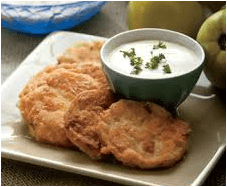 Fried patties served with a creamy dipping sauce.