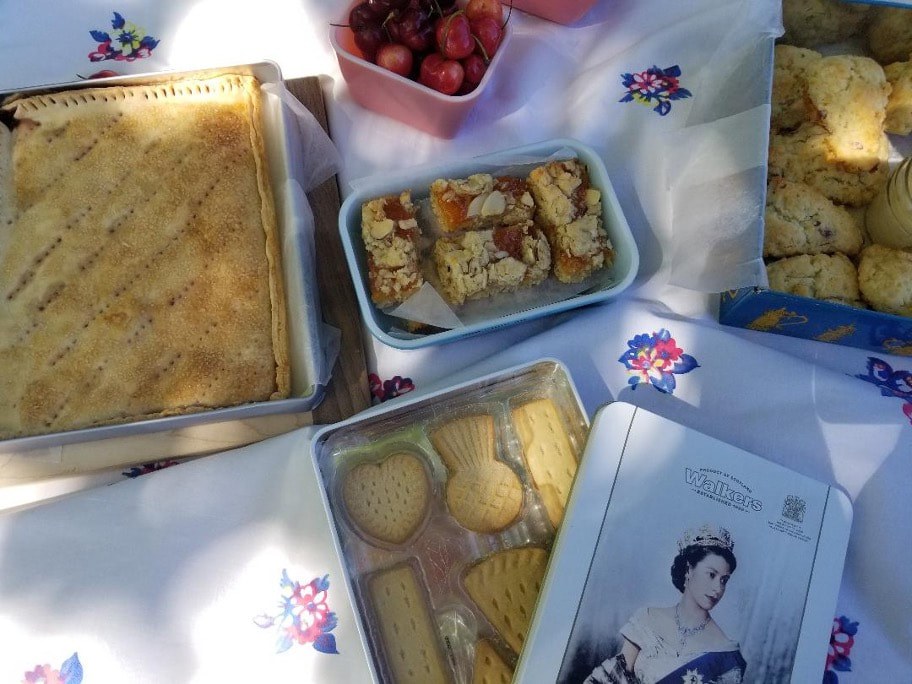 Homemade baked goods on a table with colorful decorations.