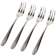 Four stainless steel forks arranged side by side.