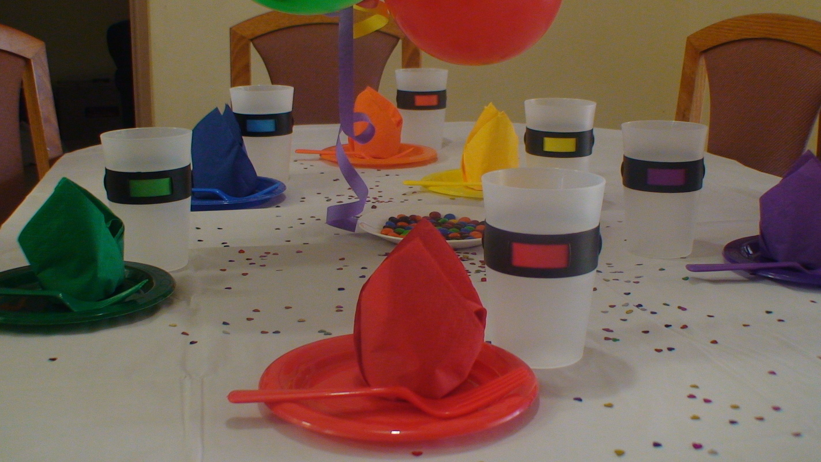 MyColourCups set around a decorated party table with colorful place settings