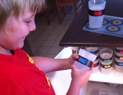 Child choosing a personalized MyColourCup