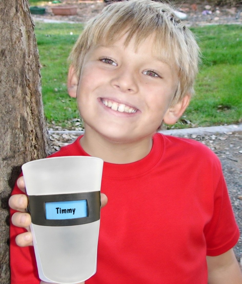 Child holding a personalized MyColourCup