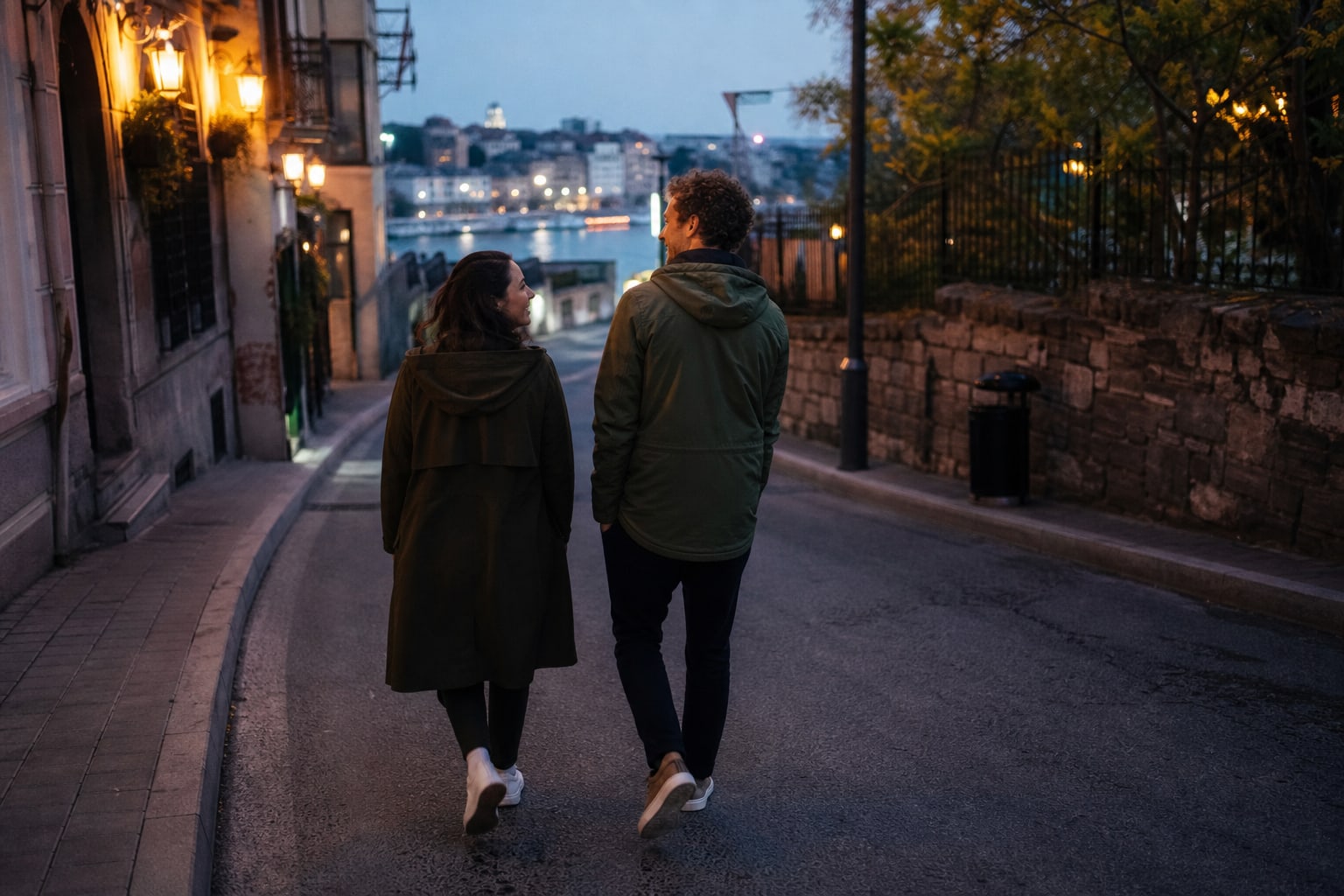 Long-term couple laughing together on an evening walk