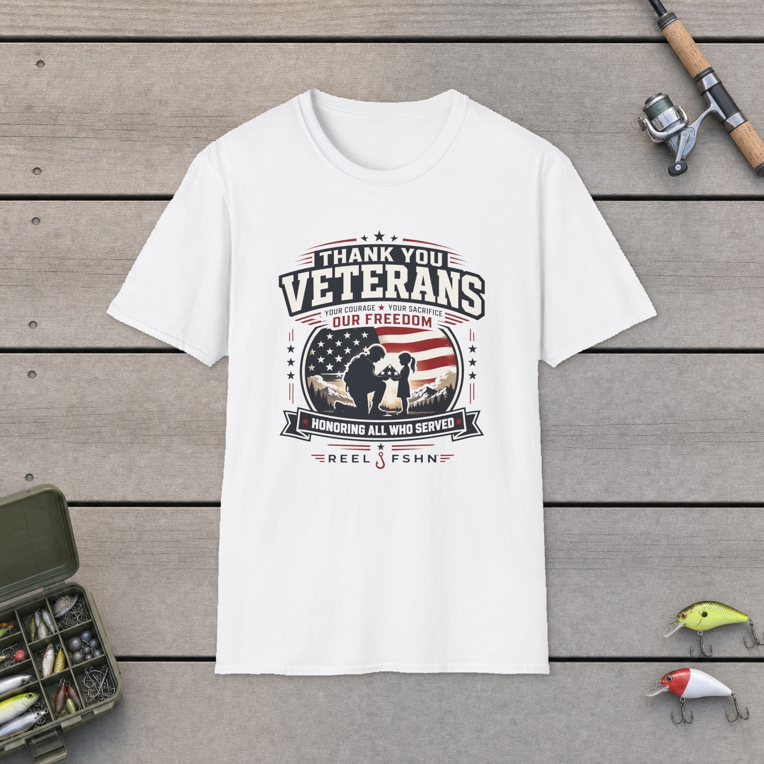 Thank You Veterans Honoring All Who Served T-Shirt on a wooden dock with a fishing rod, reel, tackle box, and two lures