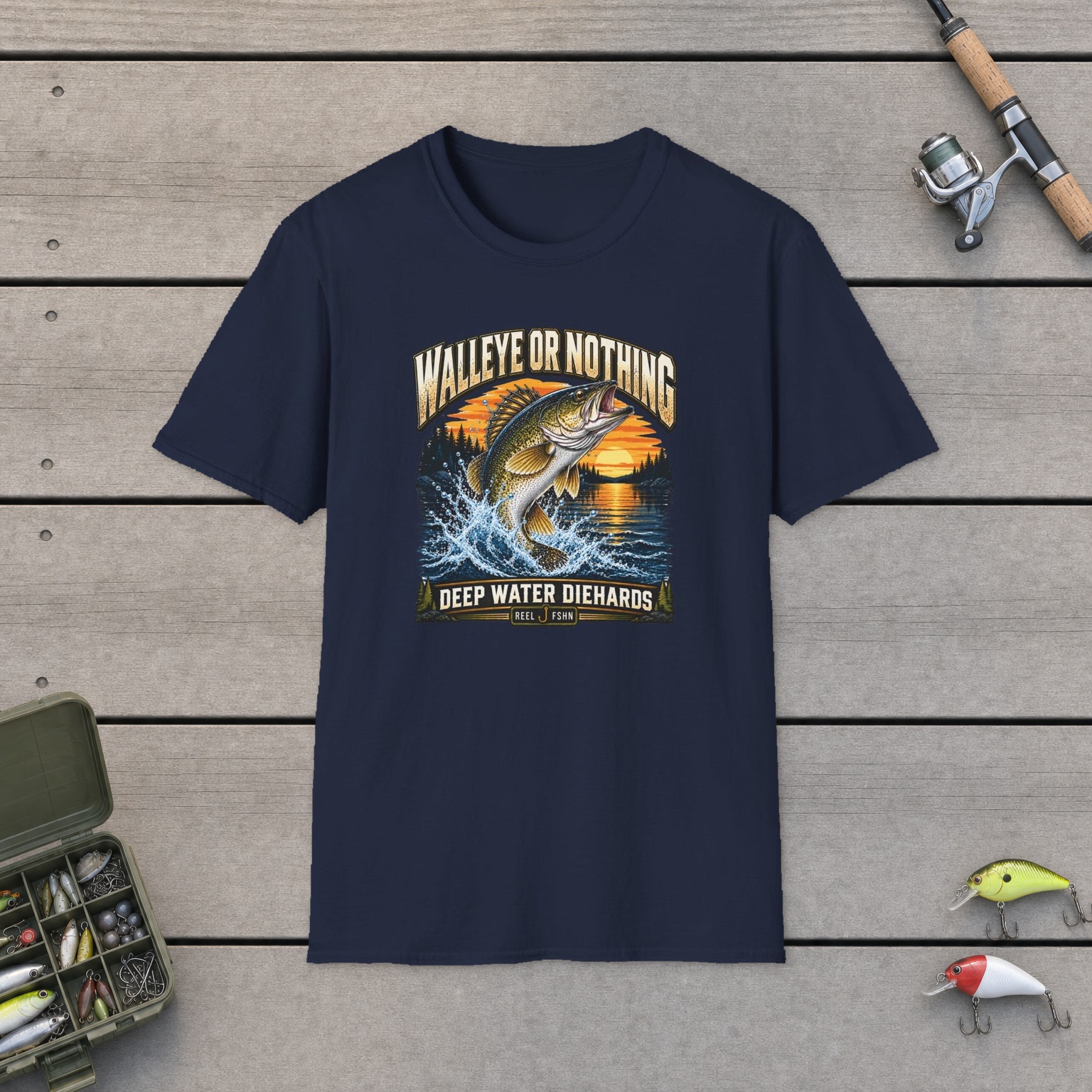 Walleye or Nothing T-Shirt on a wooden dock with a fishing rod, reel, tackle box, and two lures