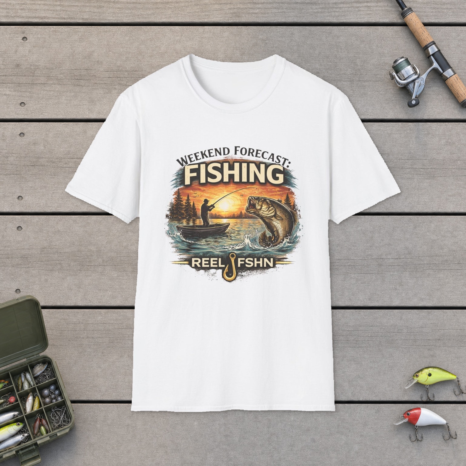 Weekend Forecast: Fishing T-Shirt on a wooden dock with a fishing rod, reel, tackle box, and two lures