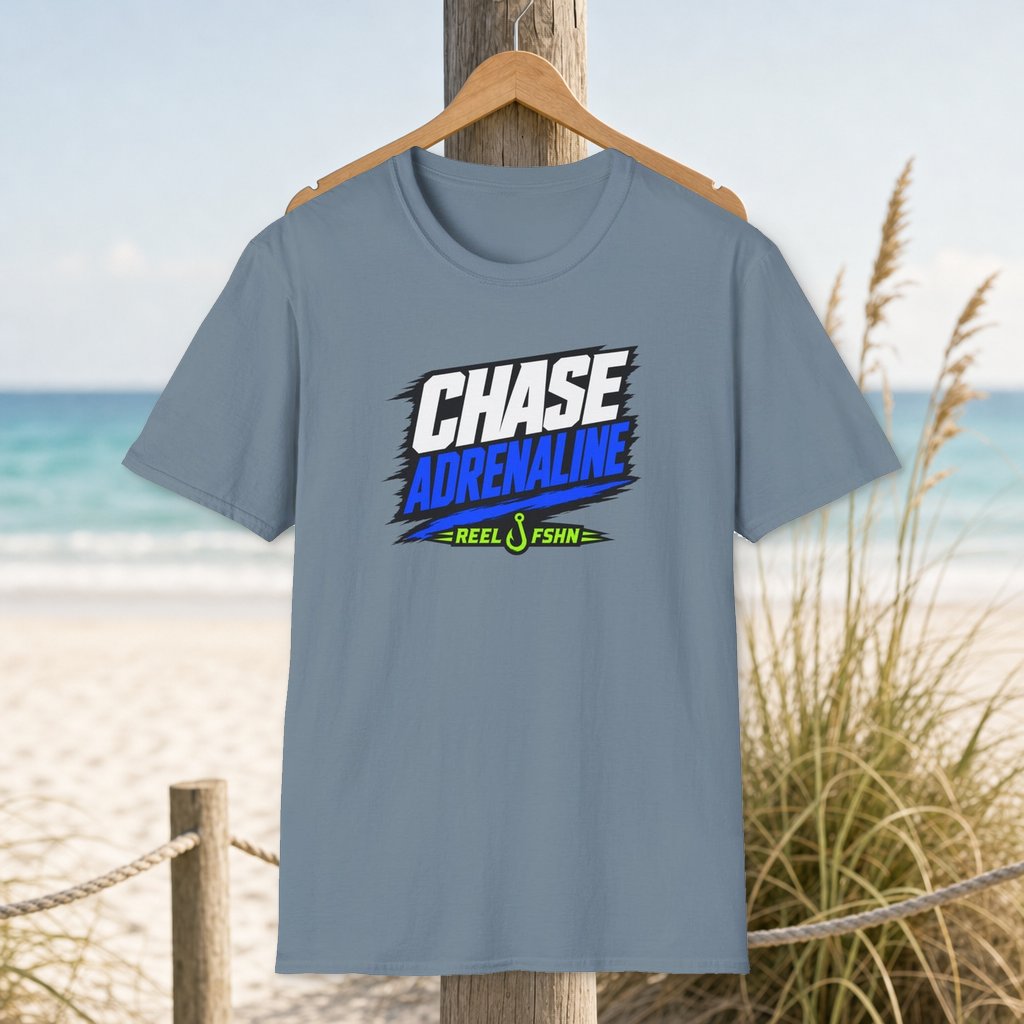 Chase Adrenaline T-Shirt on a hanger beside a sandy beach and turquoise coastal water