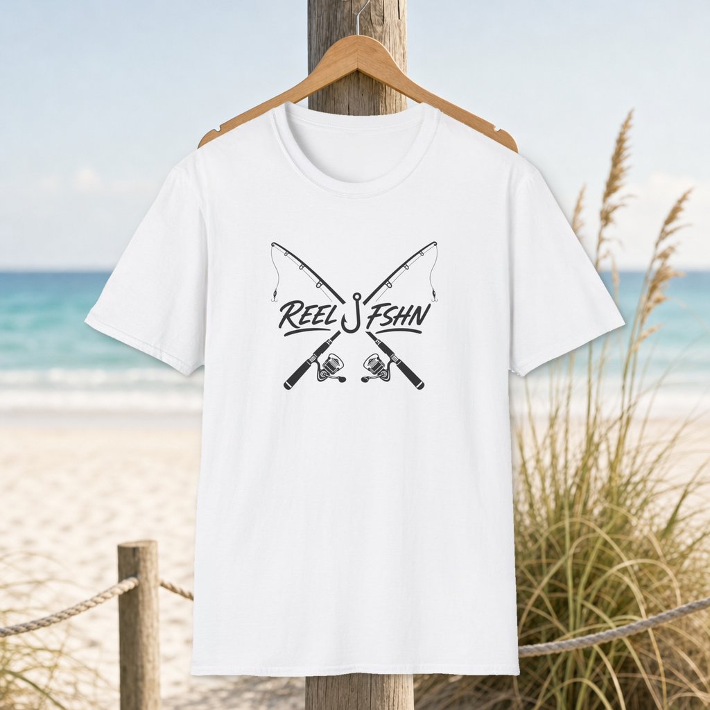 Crossed Rods T-Shirt on a hanger beside a sandy beach and turquoise coastal water