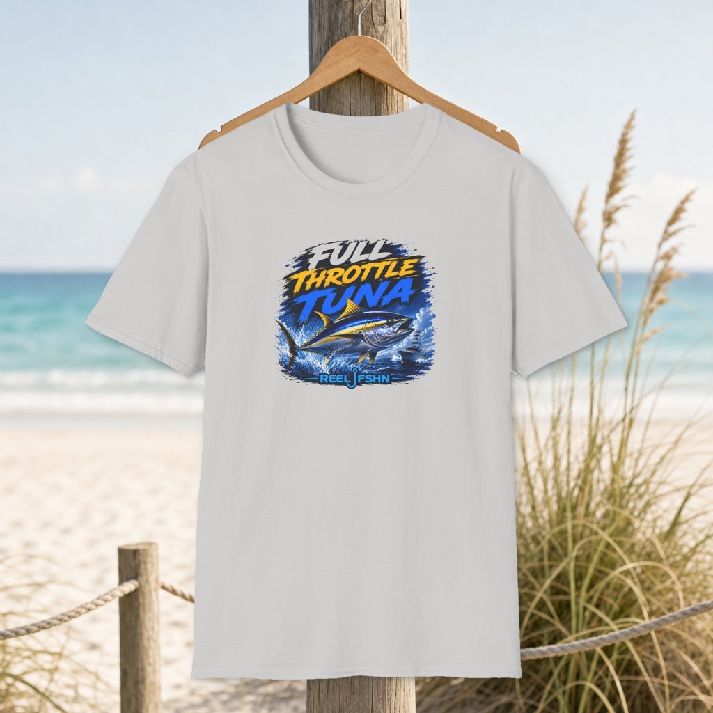 Full Throttle Tuna T-Shirt on a hanger beside a sandy beach and turquoise coastal water
