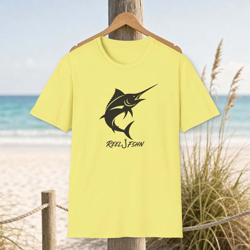 Marlin with Logo T-Shirt on a hanger beside a sandy beach and turquoise coastal water
