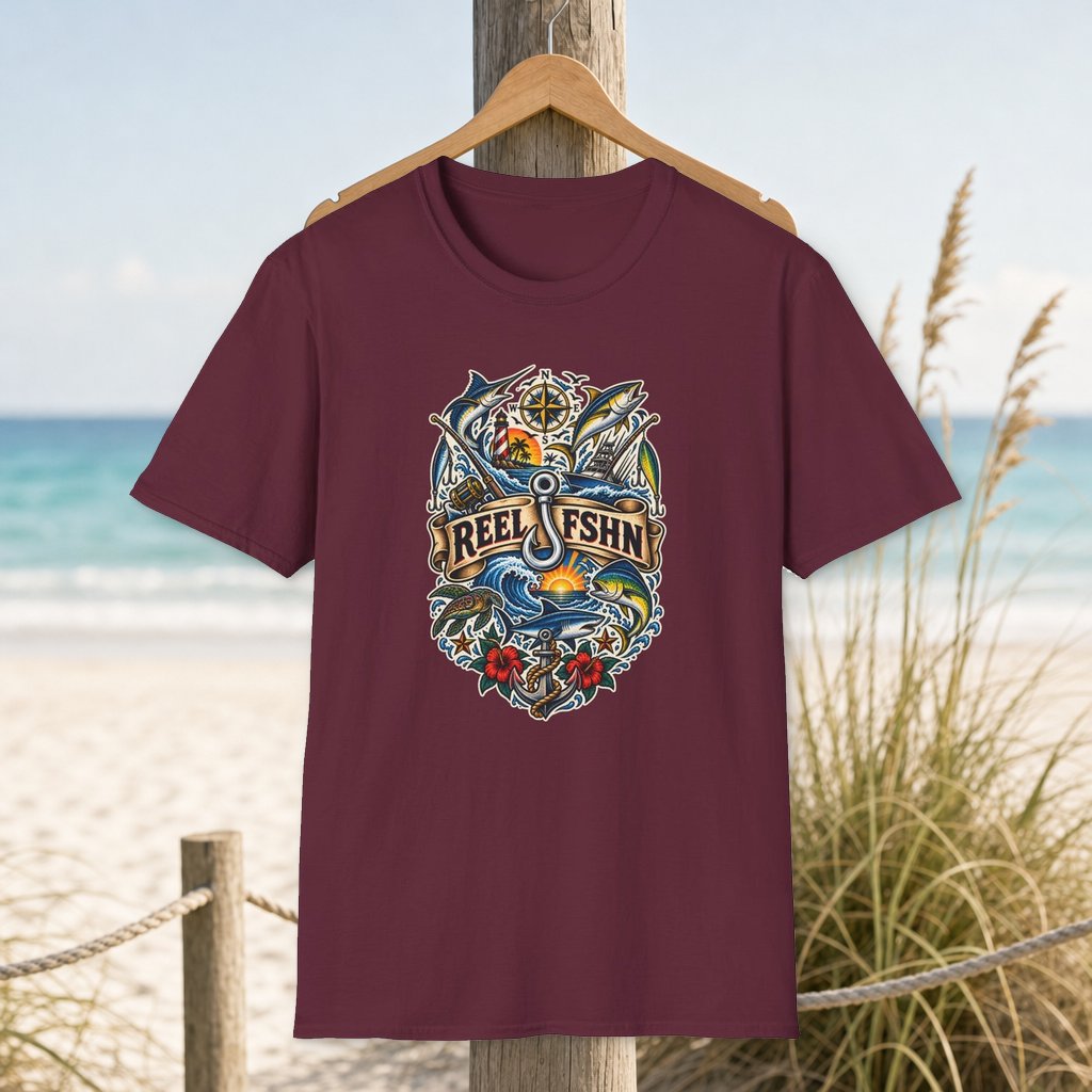 Tide Chart Tatoo T-Shirt on a hanger beside a sandy beach and turquoise coastal water