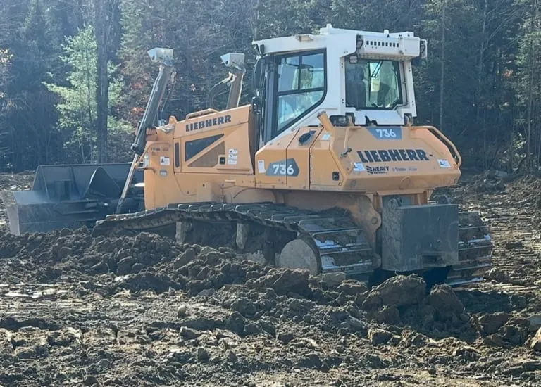 Access road work on a Maine land-clearing project