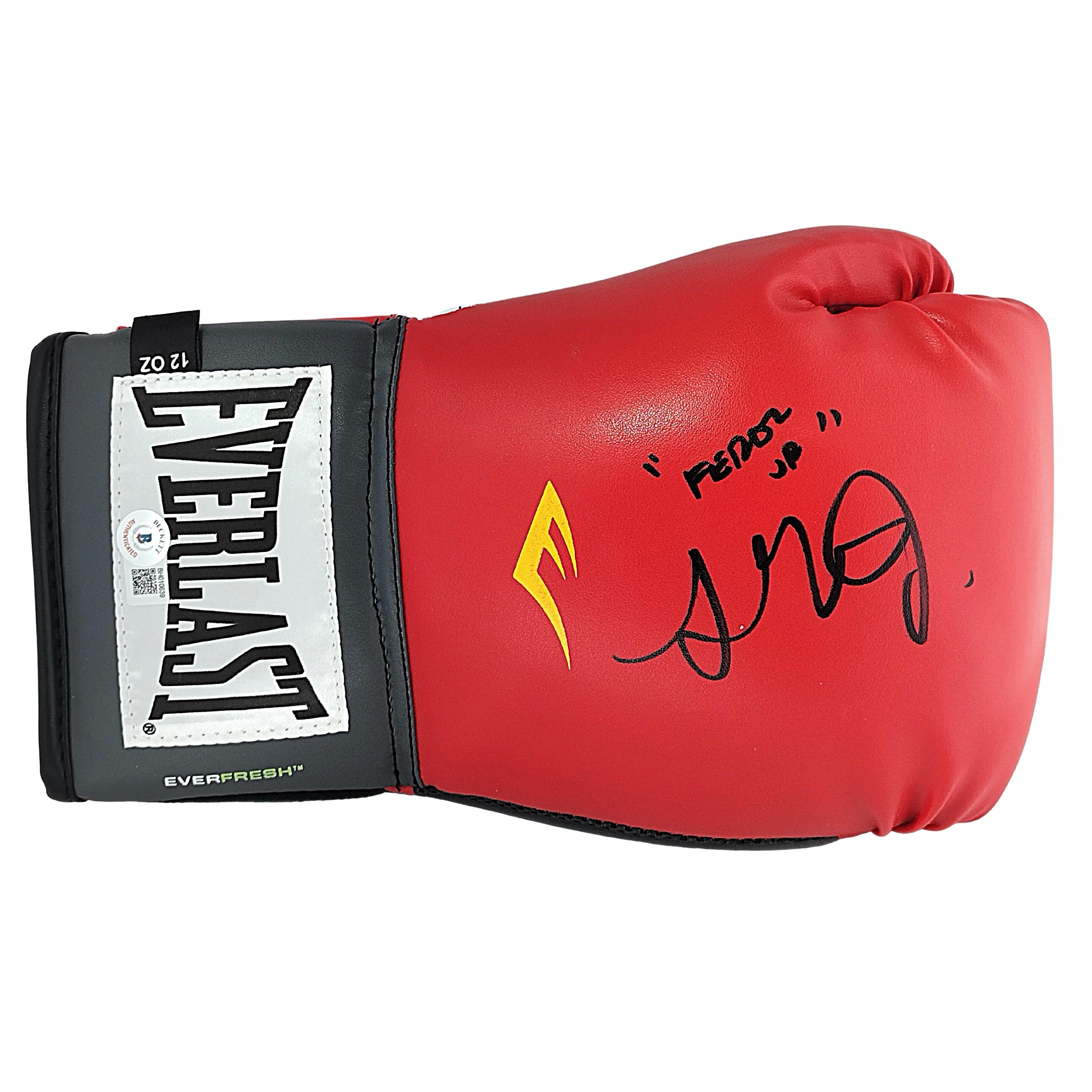 Authenticated signed boxing glove with a visible signature