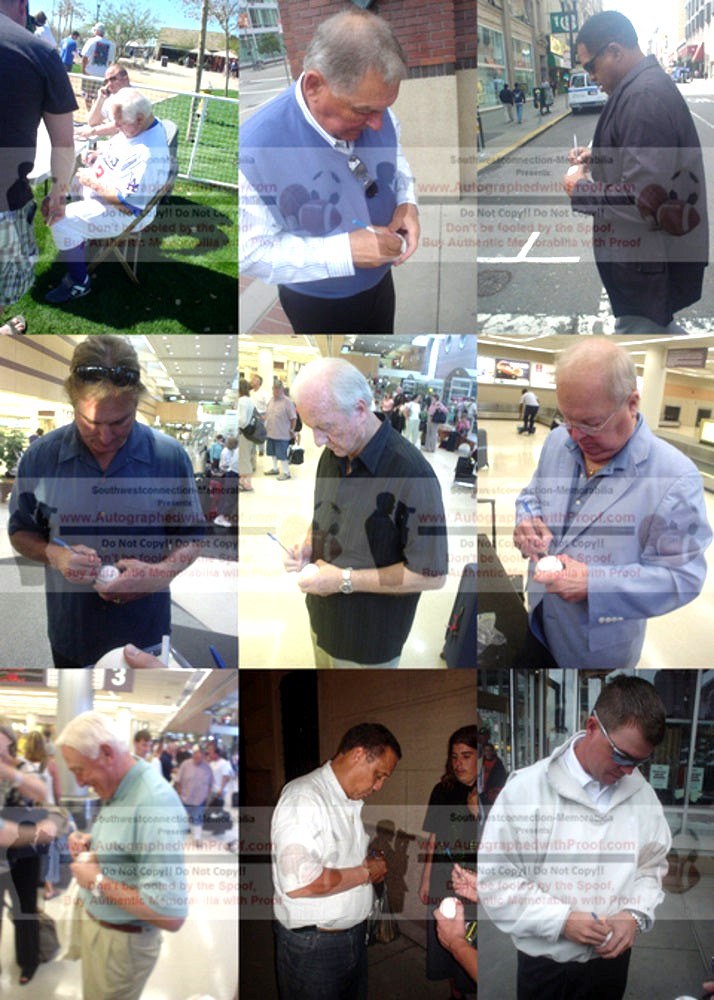 Hall of Fame players signing a multi-autographed baseball