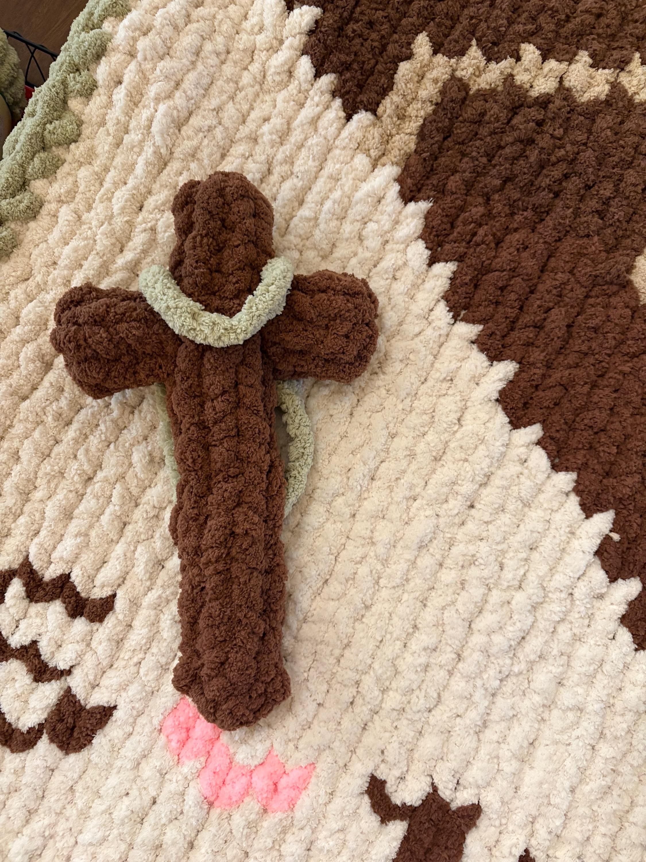 Cross with sash chunky knit pillow