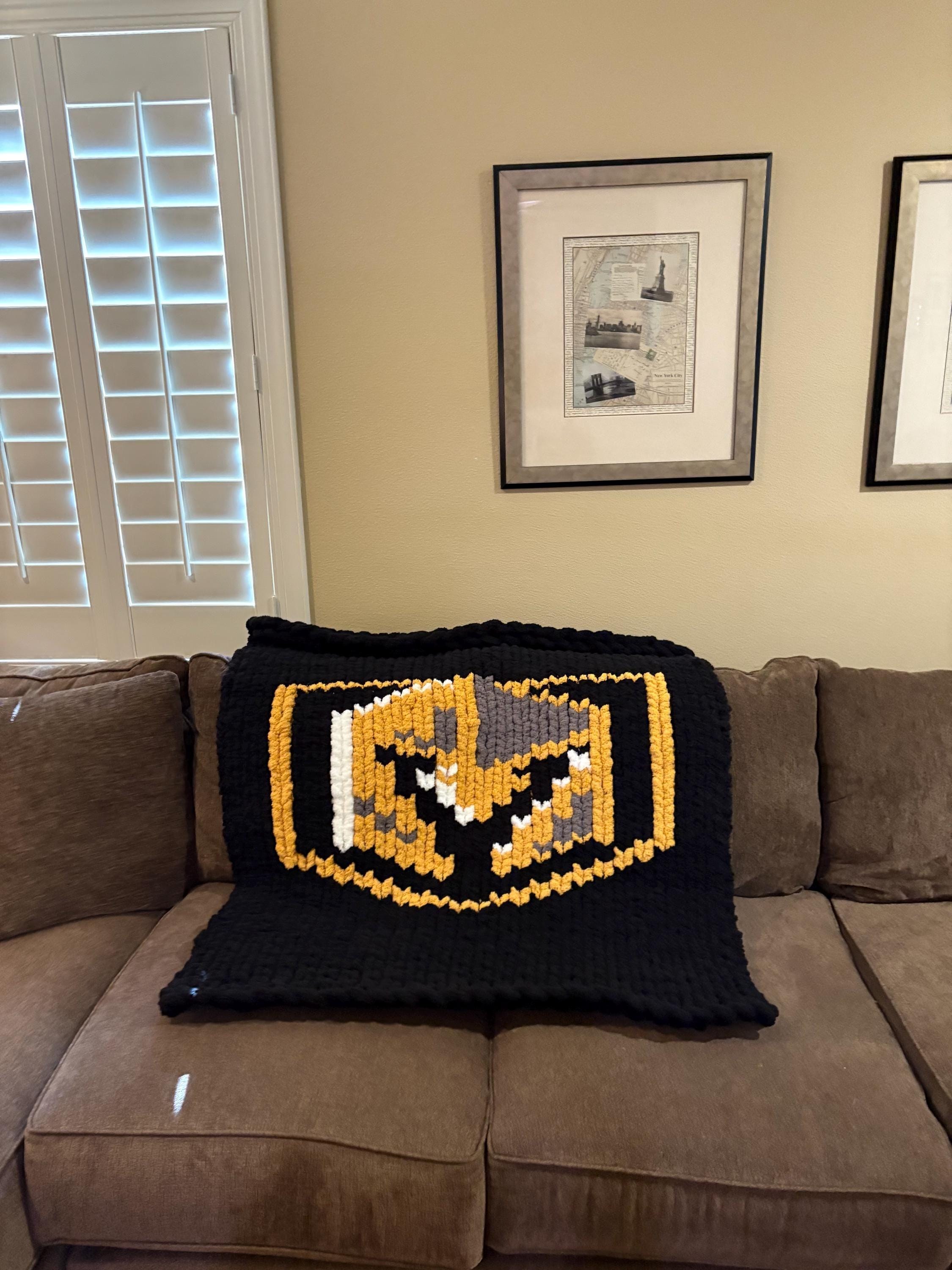 VGK shield lap blanket in black