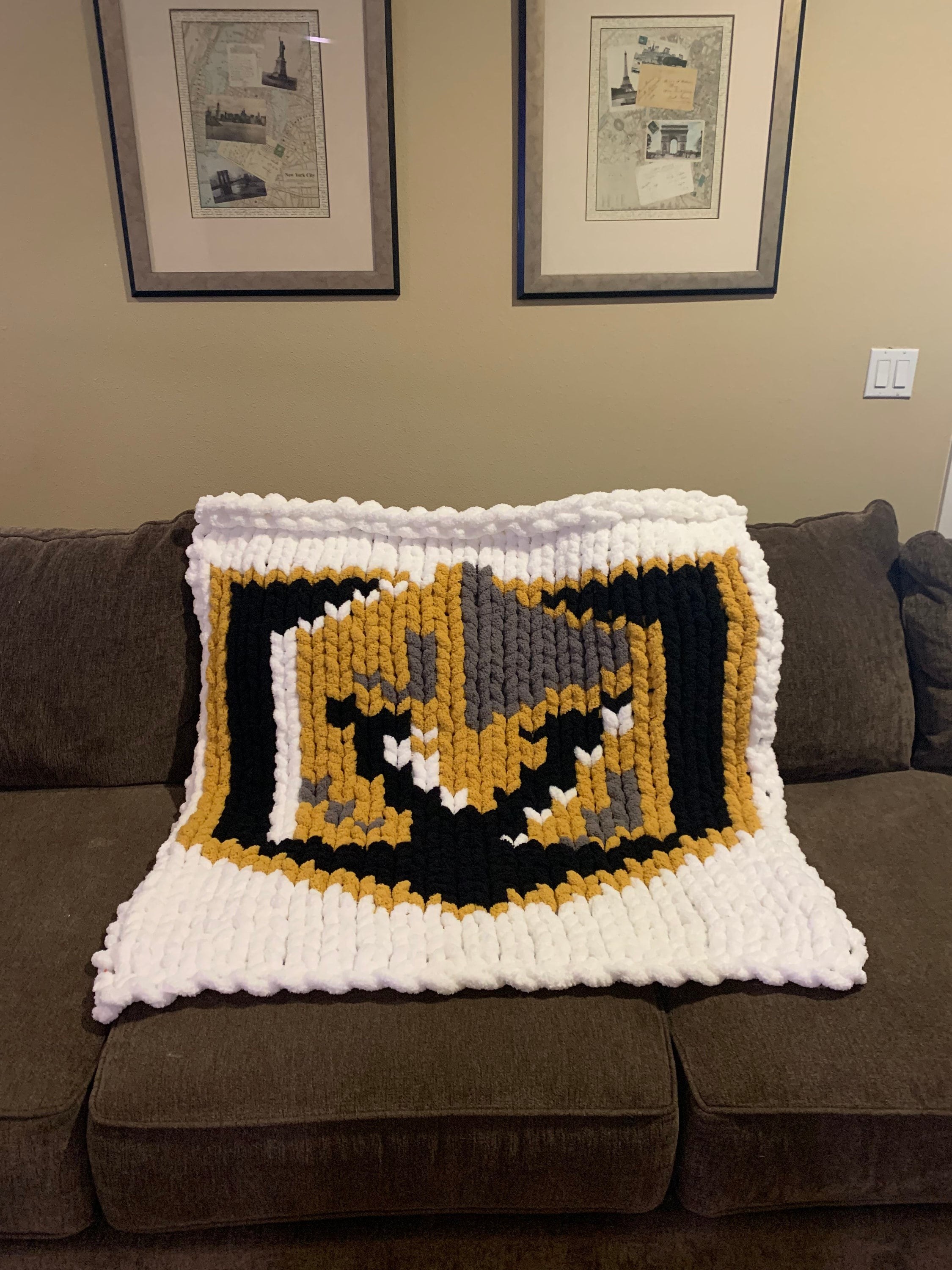 VGK shield lap blanket ivory background
