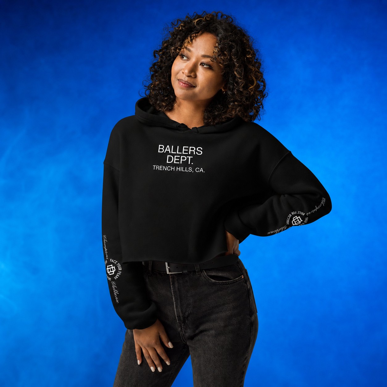 Athlete wearing the Her Ball Her Grind collection hoodie