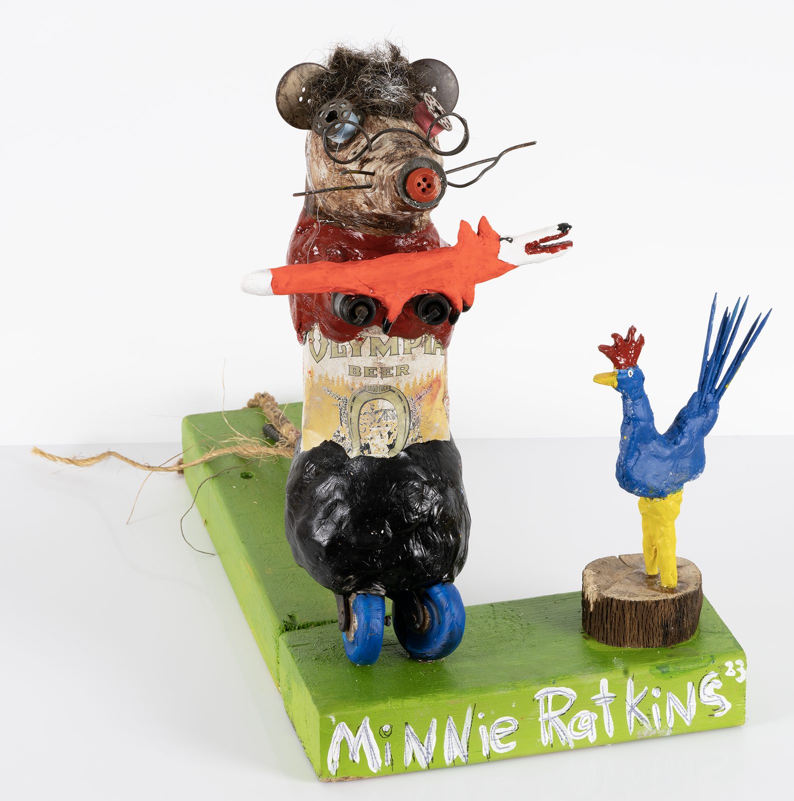 Minnie Ratkins, a found-object rat sculpture with colorful sculpted details