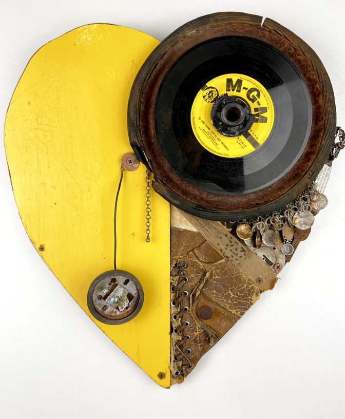 Yellow Heart assemblage with a vinyl record and reclaimed materials