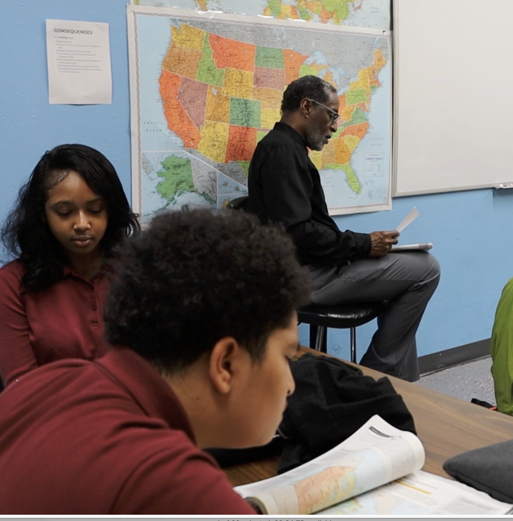 J.W. Reed Christian Academy students learning with an educator in the classroom