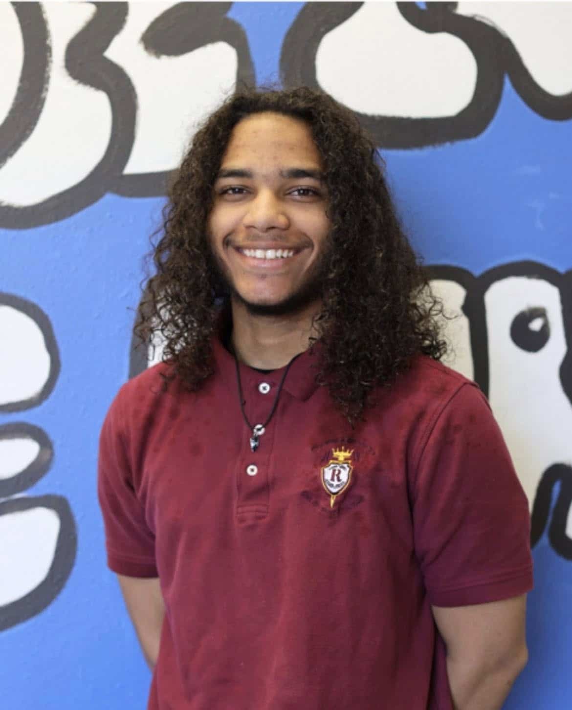 J.W. Reed Christian Academy graduate celebrating a school milestone