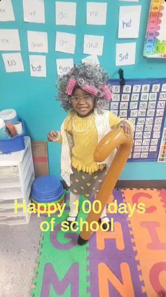 Preschool student celebrating a school day