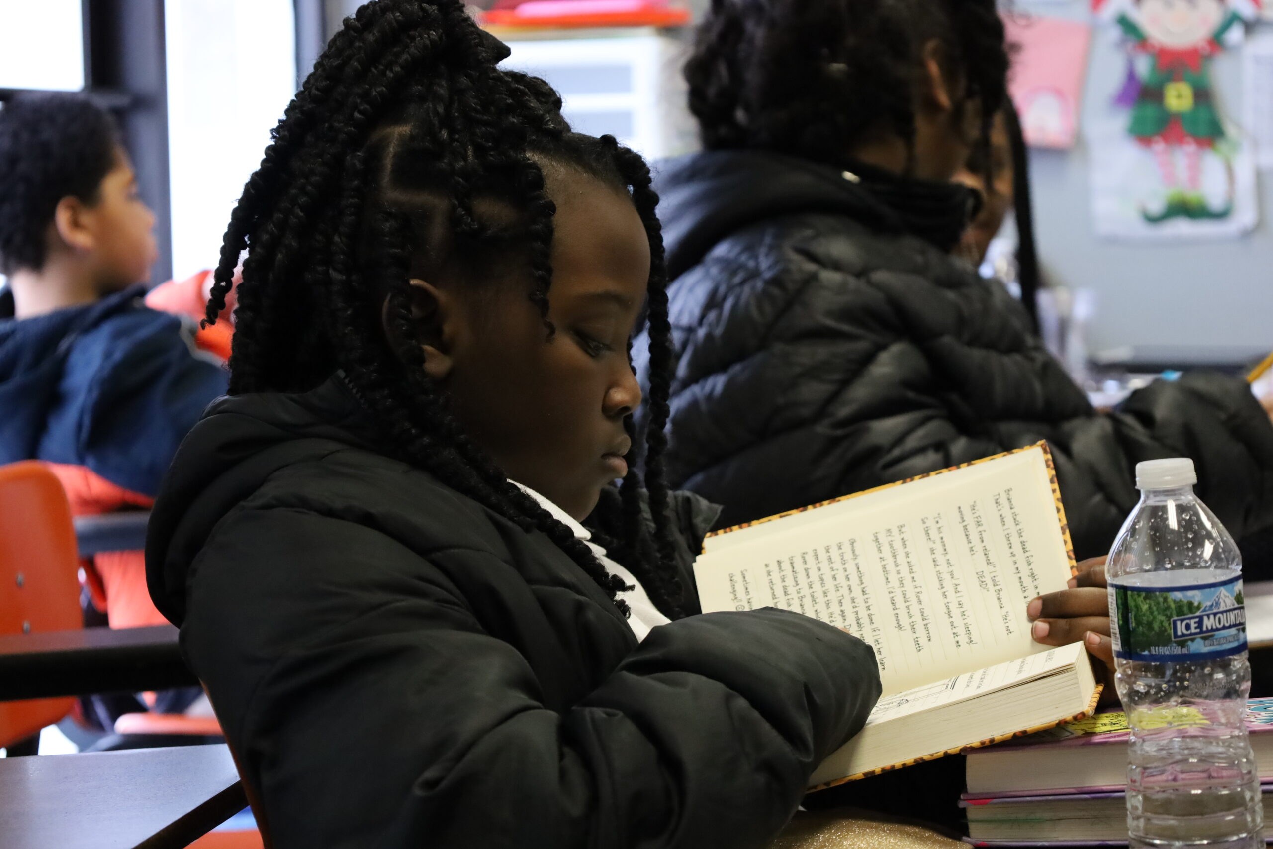 Student reading during class