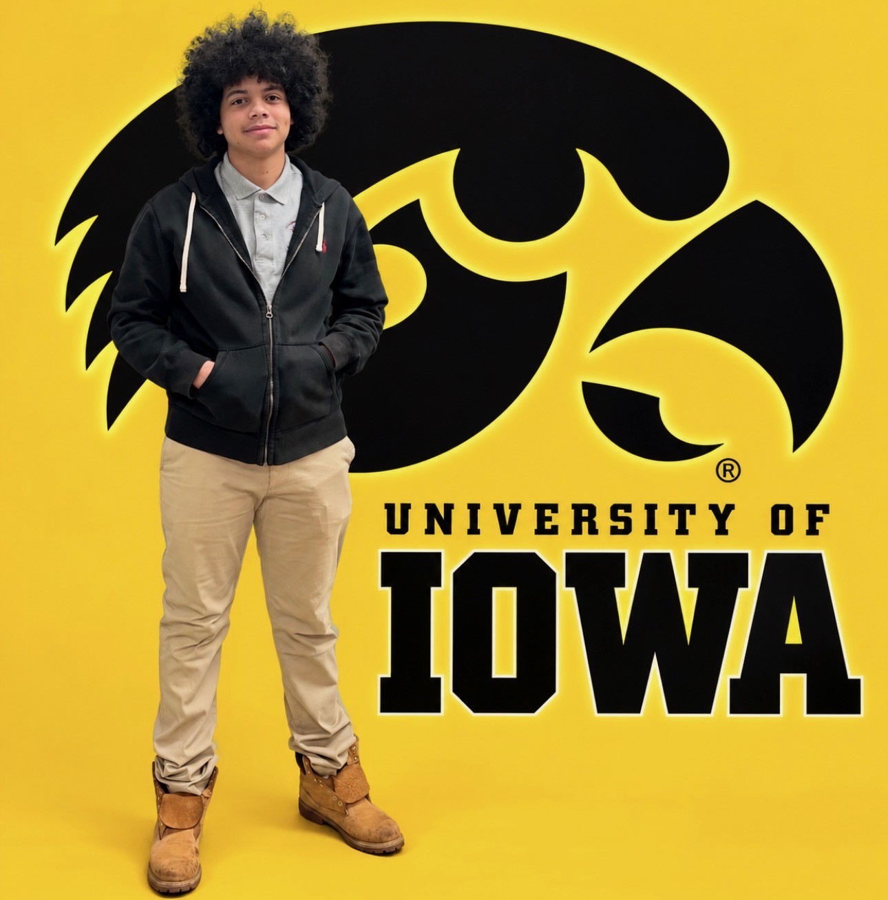 Gabriel, JWRCA Class of 2027 senior, pictured with the University of Iowa Hawkeye logo