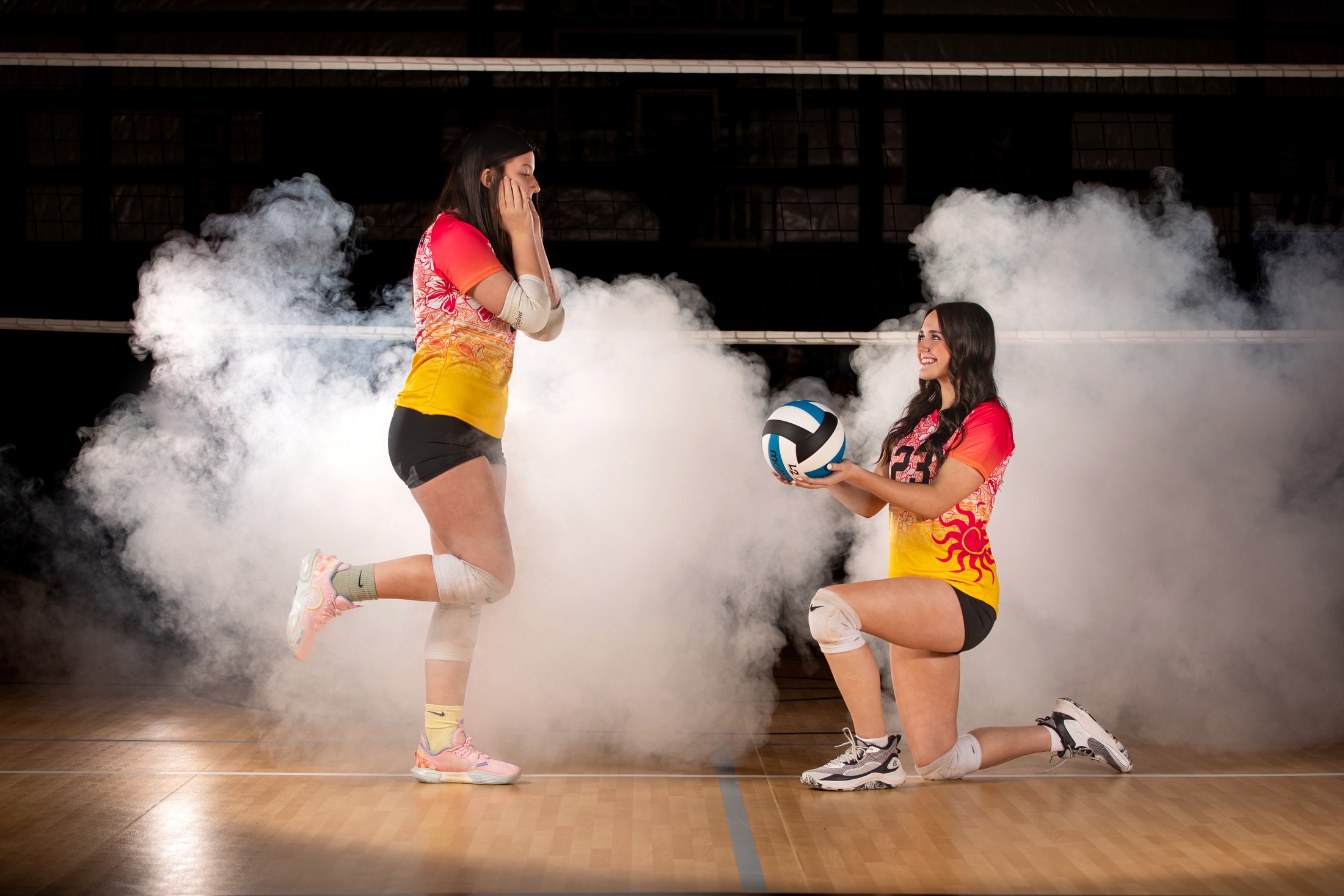 Two Club IMUA Volleyball athletes practicing together