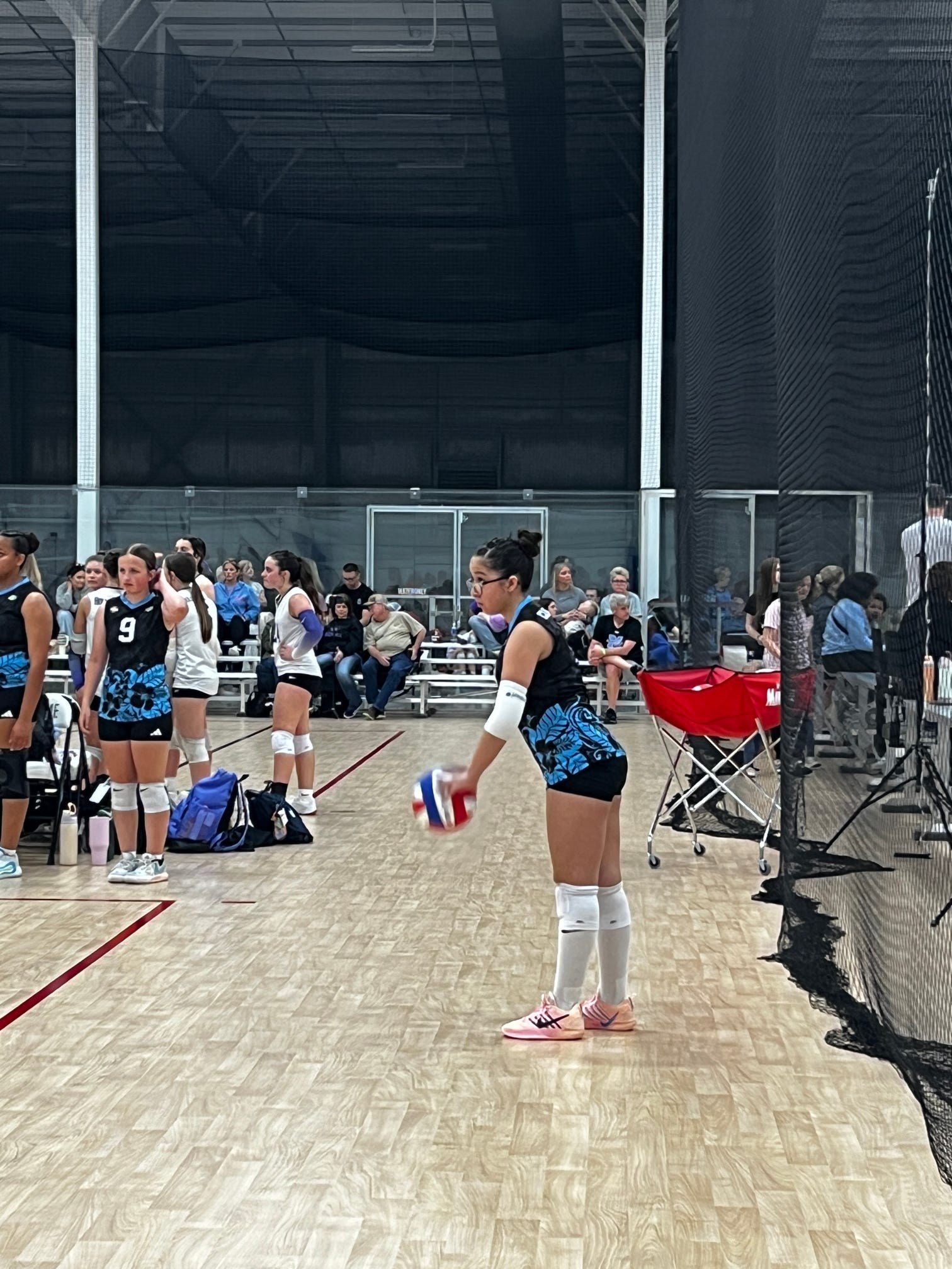 Club IMUA Volleyball athletes practicing together on the court